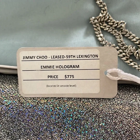 Jimmy Choo
Emmie Glitter Leather Clutch Bag - Picture 12 of 12